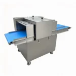 Horizontal meat slicer slicing boneless beef in meat processing plant